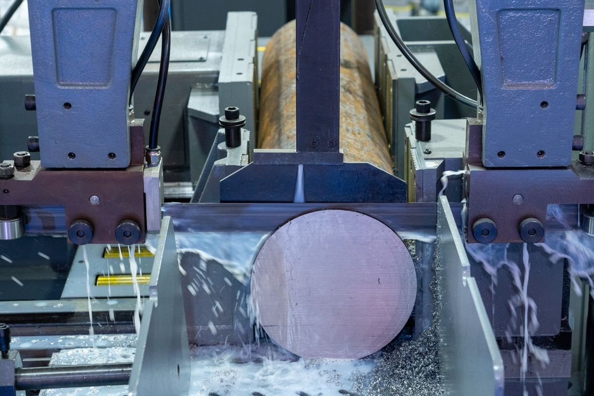 Machine tool cutting a steel disc